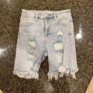 Risen boyfriend torn Jean shorts